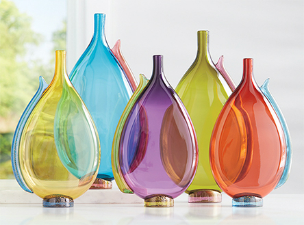 Serif Flasks by Vetro Vero, Elegant forms and luminous colors define these stunning blown glass vessels. A flourish of contrasting color adds eye-catching asymmetry to each flattened profile, while the foot shimmers with a touch of 24k gold leaf.